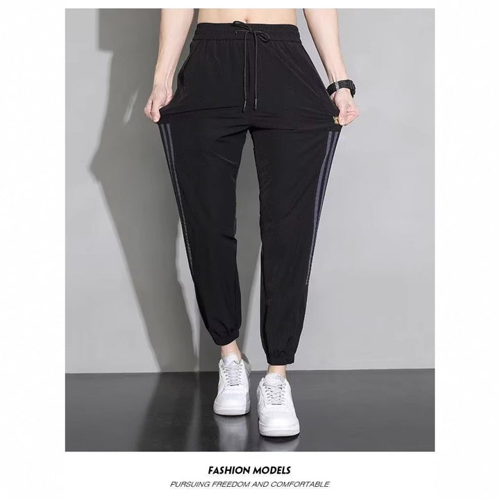 Damen Sportliche Trainingshose mit seitlichen Streifen Drune