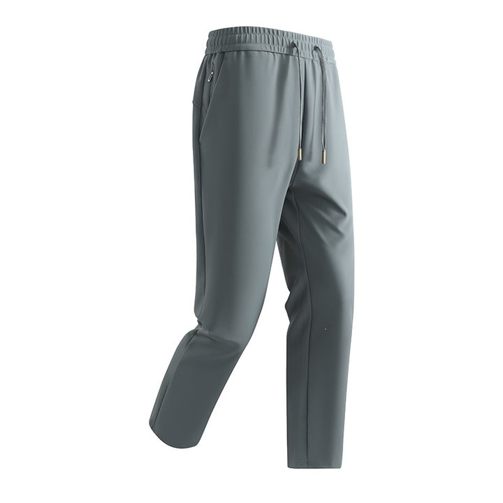 Herren Slim-Tapered Performance-Jogginghose aus wasserabweisendem Funktionsstoff mit elastischem Kordelbund & verdeckten Reißverschlusstaschen Drune