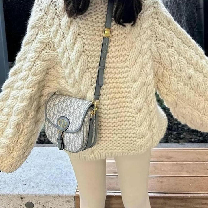 Damen Grobstrickpullover mit oversized Schnitt und kunstvollem Zopfmuster Drune