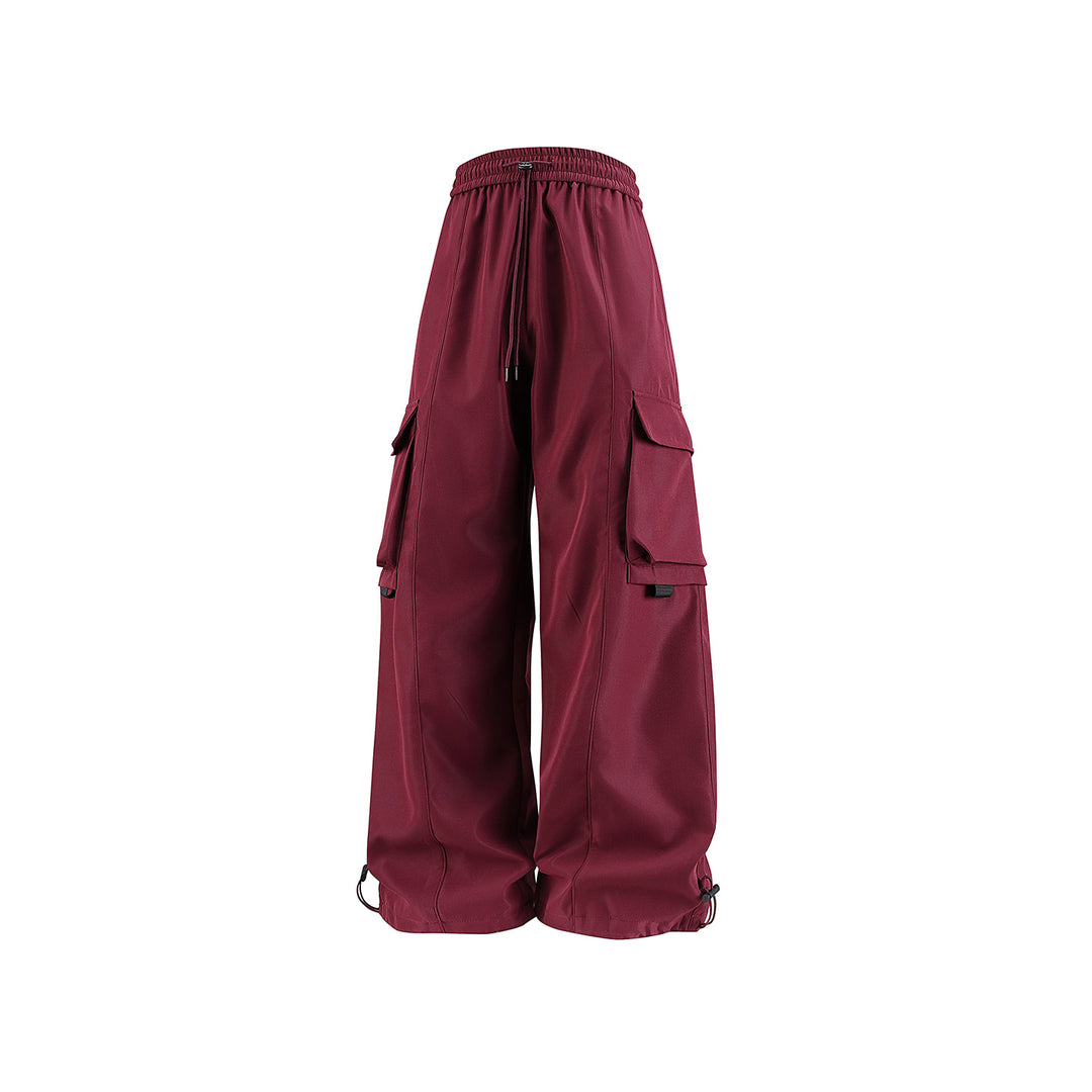 Herren weite Utility‑Cargohose im Baggy‑Cut mit Tunnelzugbund, großen Klappentaschen und verstellbarem Beinabschluss Drune