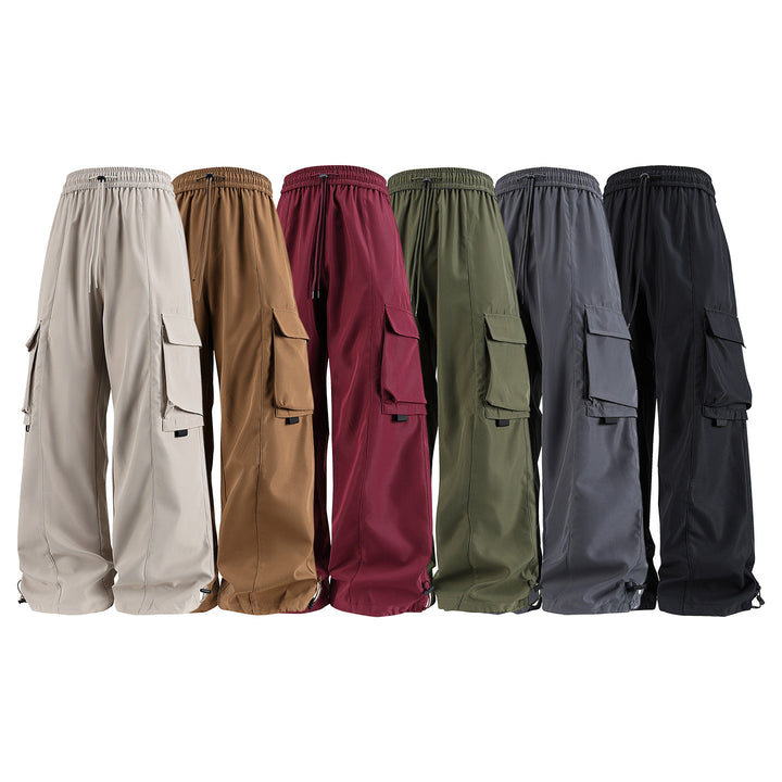 Herren weite Utility‑Cargohose im Baggy‑Cut mit Tunnelzugbund, großen Klappentaschen und verstellbarem Beinabschluss Drune