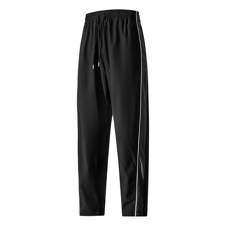 Herren Leichte Trainingshose im Relaxed-Fit mit elastischem Tunnelzugbund und kontrastseitiger Paspel Drune