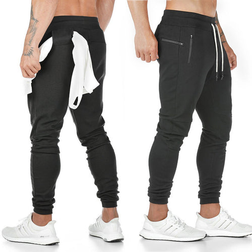 Herren nan schmal geschnittene Jogginghose mit Rippbund, Reißverschlusstasche und Knieabnähern Drune