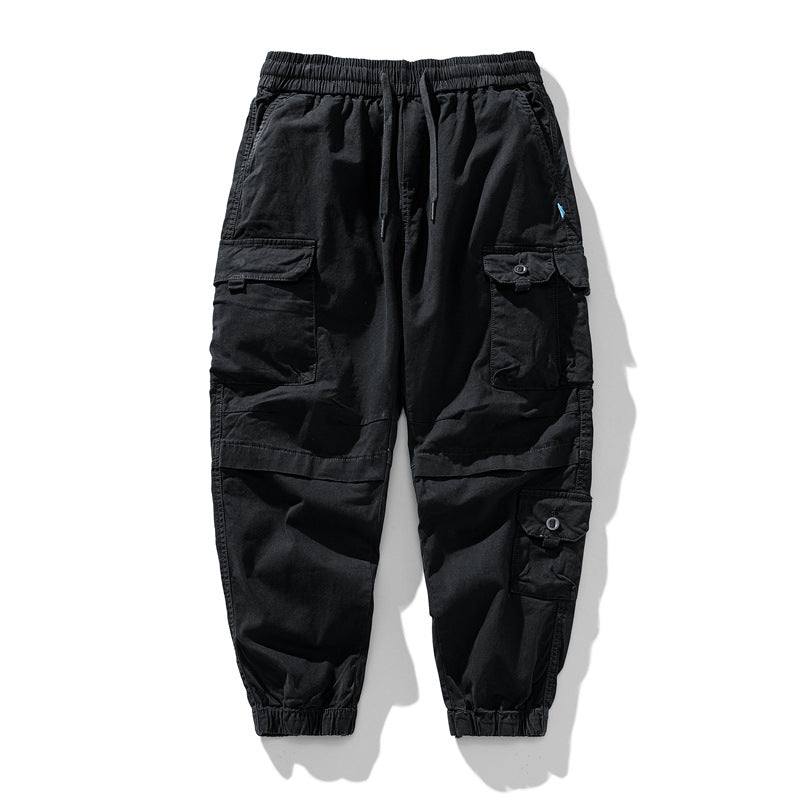 Herren Leichte Canvas-Cargohose im Joggerstil mit elastischem Bund, segmentierten Kniepaneelen und verdeckten Klappentaschen Drune