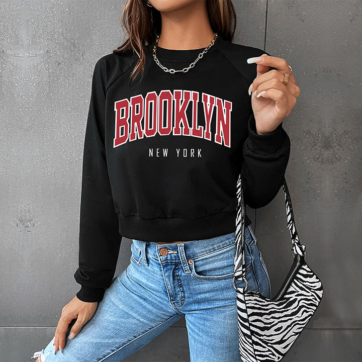 Damen Cropped College-Sweatshirt mit Rundhalsausschnitt, Raglanärmeln und Brooklyn-Print Drune