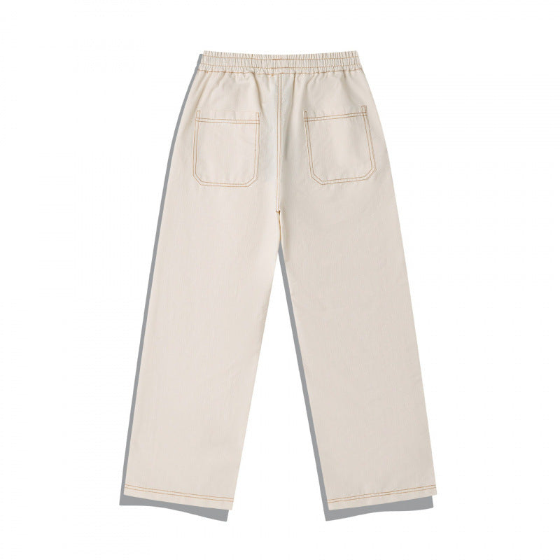 Unisex Weite Denim-Hose mit elastischem Bund, Kordelzug und gesteppter Kniepasse Drune