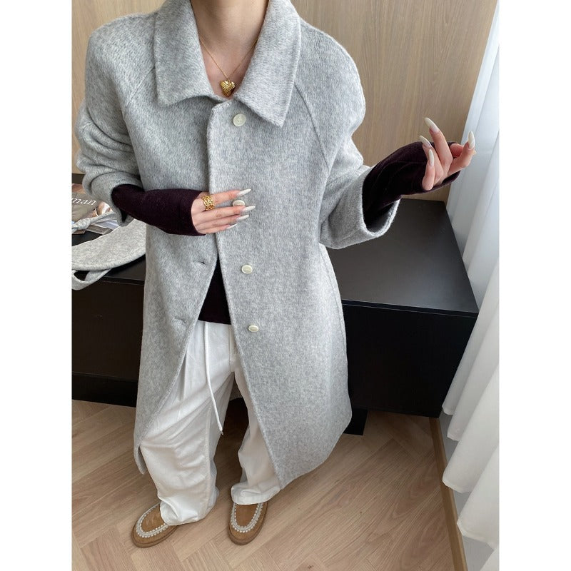 Damen eleganter Schnittstrickmantel mit praktischen Taschen Drune
