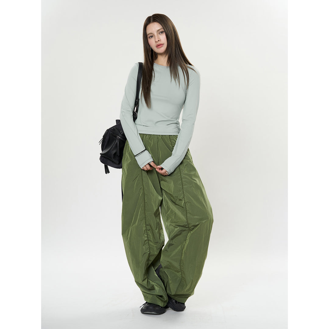 Damen Figurbetontes Langarm‑Funktionsshirt mit Daumenloch und Stretchnähten Drune