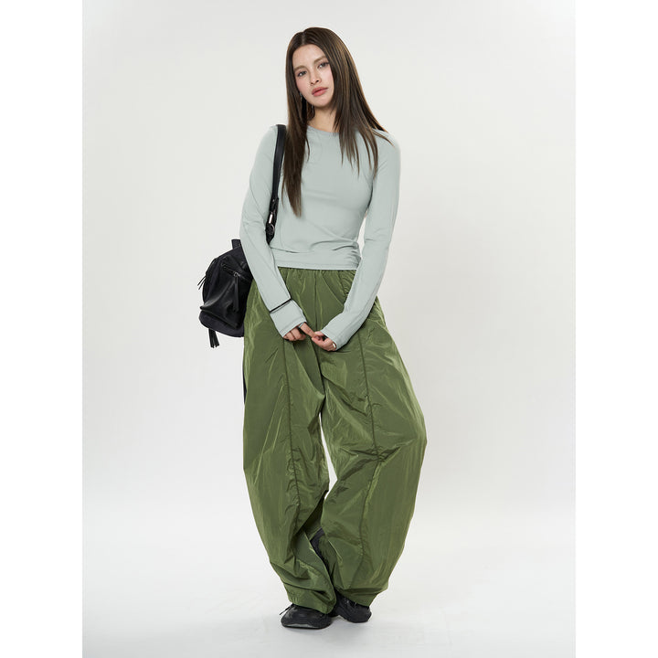 Damen Figurbetontes Langarm‑Funktionsshirt mit Daumenloch und Stretchnähten Drune