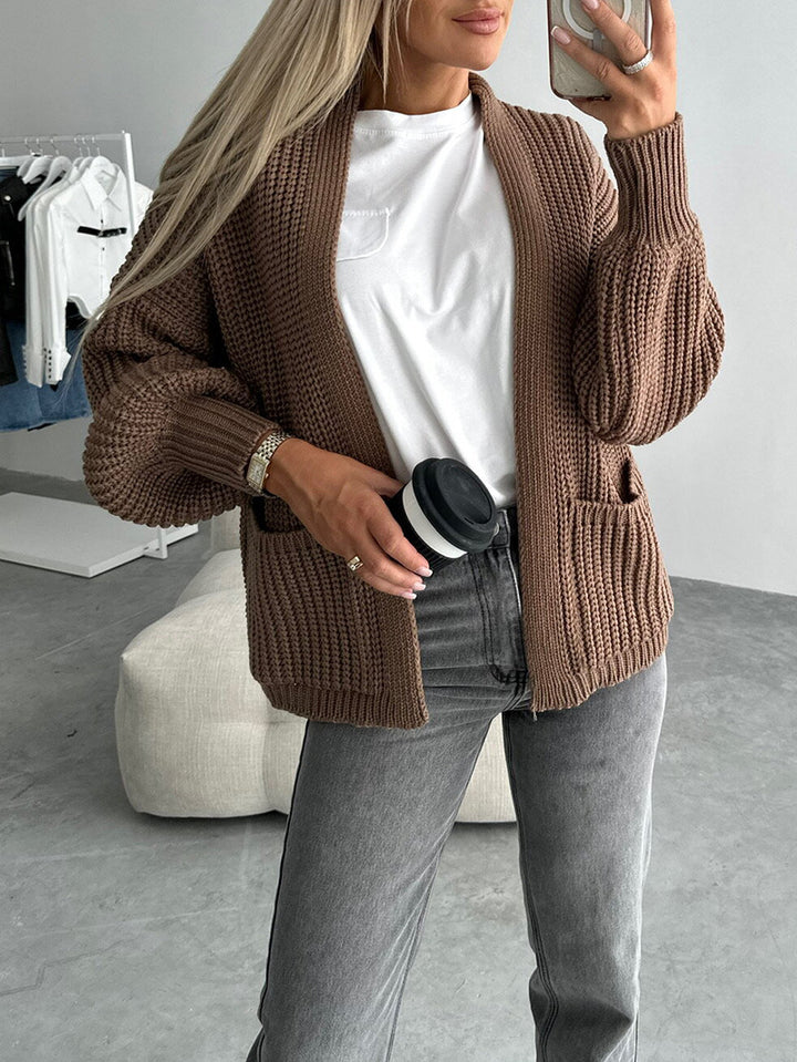 Damen moderne Strickjacke mit voluminösen Ärmeln und Taschen Drune