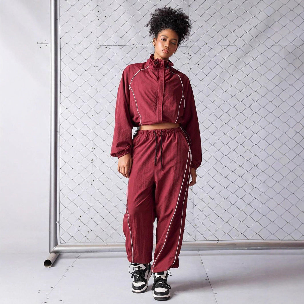 Damen sportives Cropped Windbreaker-Set mit Stehkragen Tunnelzug und reflektierenden Paspeln Drune