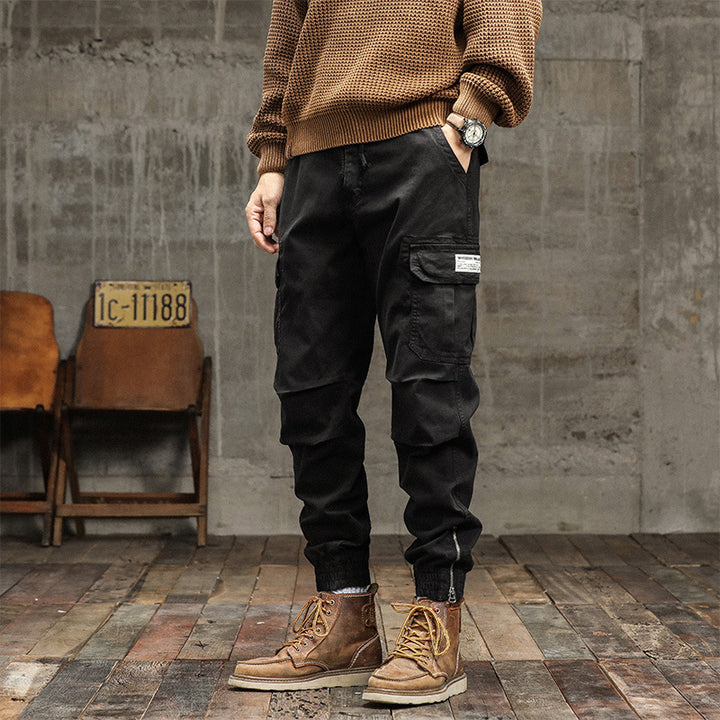 Herren Cargo-Jogginghose im urbanen Utility‑Stil mit elastischem Tunnelzugbund und verstärkten Kniepartien Drune