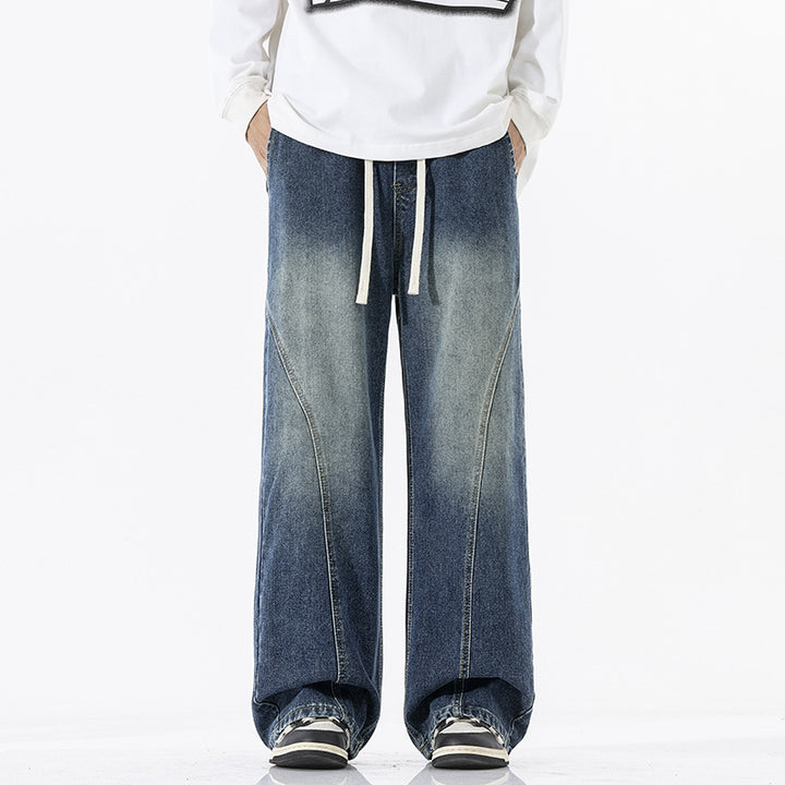 Herren Skulpturale Baggy-Denimhose mit tiefem Schritt und abgerundetem Saum Drune