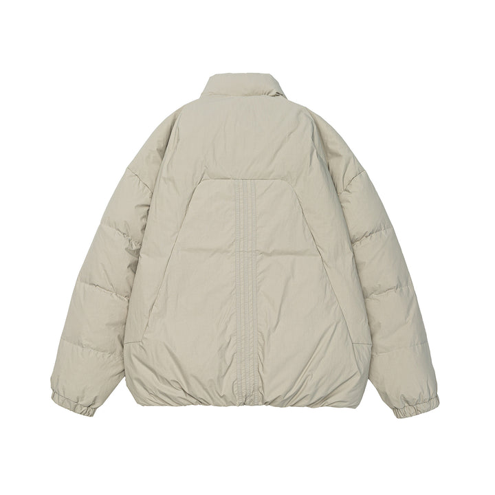 Damen Voluminöse Steppjacke mit hohem Stehkragen und winddichter Frontblende Drune