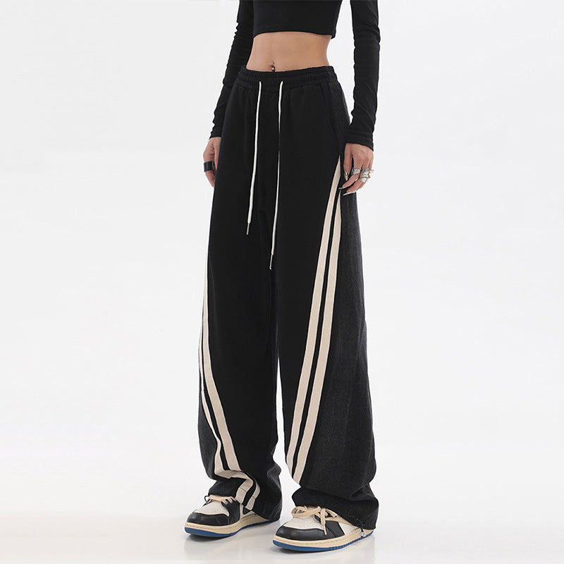 Damen nan weite Jogginghose mit hoher Taille und Jeansstoffeinsätzen sowie Seitenstreifen Drune