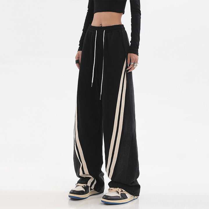 Damen nan weite Jogginghose mit hoher Taille und Jeansstoffeinsätzen sowie Seitenstreifen Drune