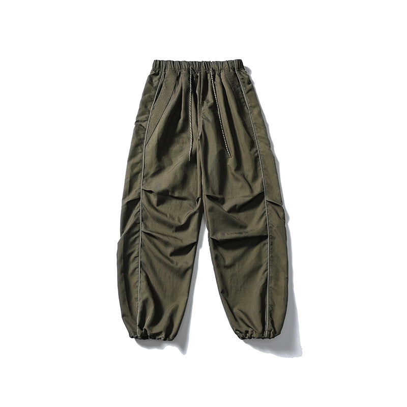 [Herren] weit geschnittene Nylon-Joggerhose im Utility-Stil mit Tunnelzugbund, Kontrastpaspel und elastischen Knöchelabschlüssen Drune