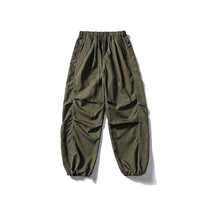 [Herren] weit geschnittene Nylon-Joggerhose im Utility-Stil mit Tunnelzugbund, Kontrastpaspel und elastischen Knöchelabschlüssen Drune