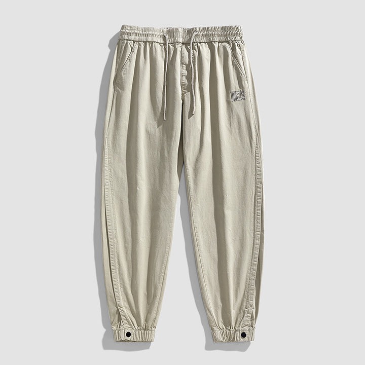 Herren Leichte Baumwoll-Joggerhose mit Tunnelzug, elastischem Knöchelabschluss und dezenter Logostickerei Drune