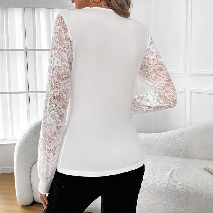 Damen nan figurbetontes Spitzenshirt mit V-Ausschnitt, transparenten Spitzenärmeln und Strassbesatz Drune