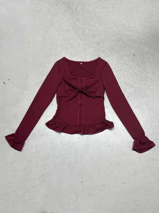 Damen Tailliertes Langarm-Cropped-Top mit Zierschleife, Knopfleiste und Volantbund Drune