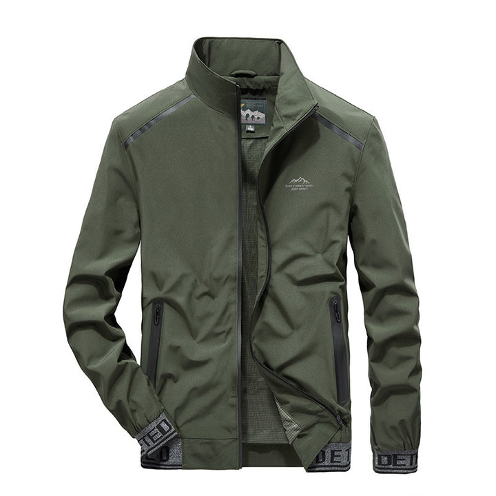 Herren Softshelljacke mit reflektierenden Einsätzen, wasserabweisenden Reißverschlusstaschen und hohem Stehkragen Drune