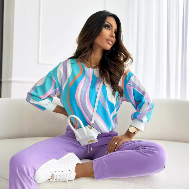 Damen lässiges Sweatshirt mit buntem Blumendruck und voluminösen Ärmeln Drune