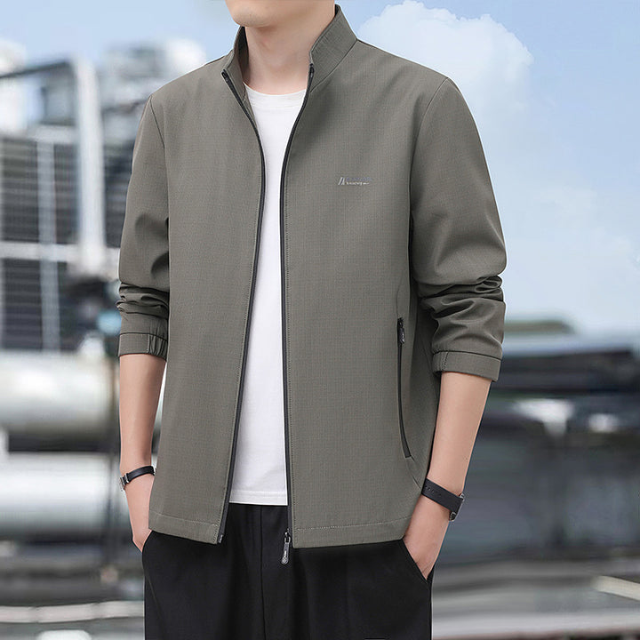 Herren Leichte Alltags-Softshelljacke mit Stehkragen, windabweisender Membran und Reißverschlusstaschen Drune