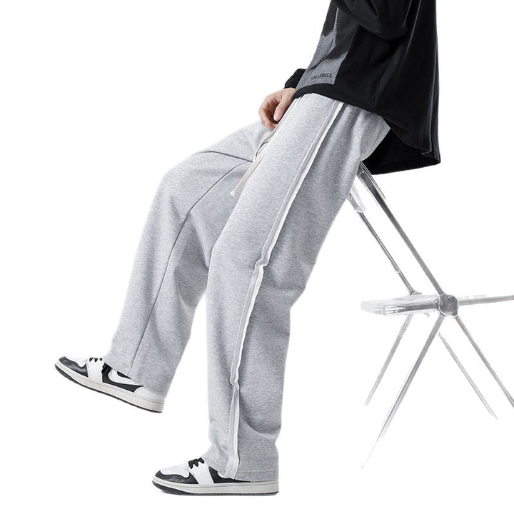 Herren weite Jogginghose im Oversize-Schnitt mit Seitenstreifen, Kordelzug & Fleecefutter Drune
