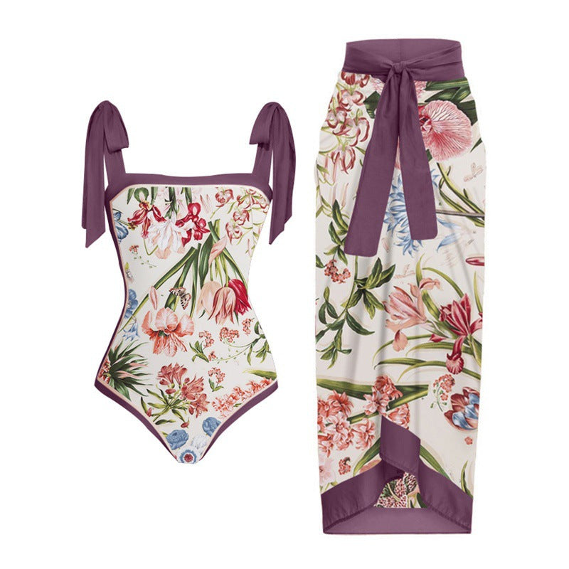 Damen Einteiler Badeanzug mit elegantem Wickelrock und modischen Riemen Drune