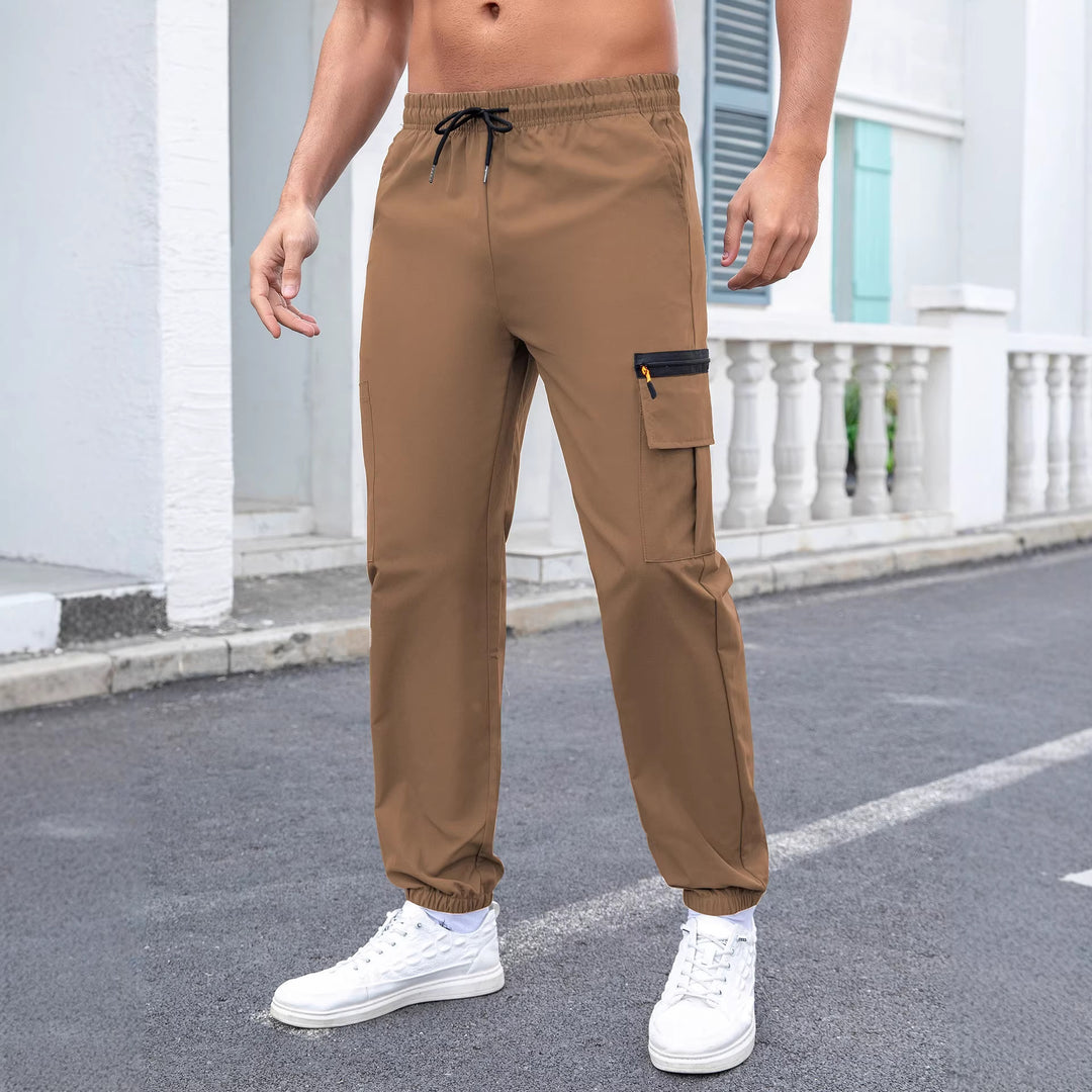 Herren Tech-Cargo-Jogginghose mit elastischem Tunnelzug, Reißverschluss‑Beintasche & eng anliegendem Fußbündchen Drune