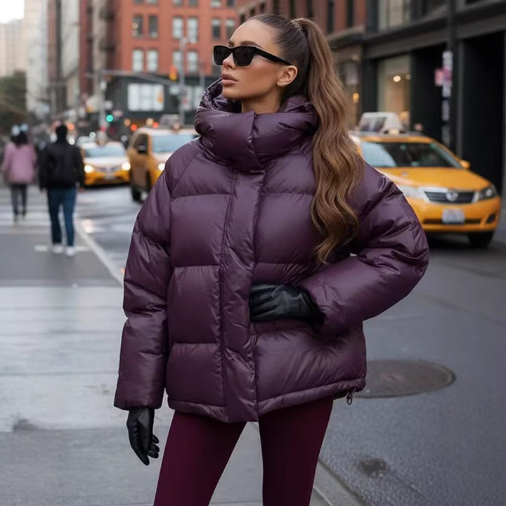 Damen Kurze wattierte Oversize‑Steppjacke mit hohem Stehkragen und Kapuze Drune