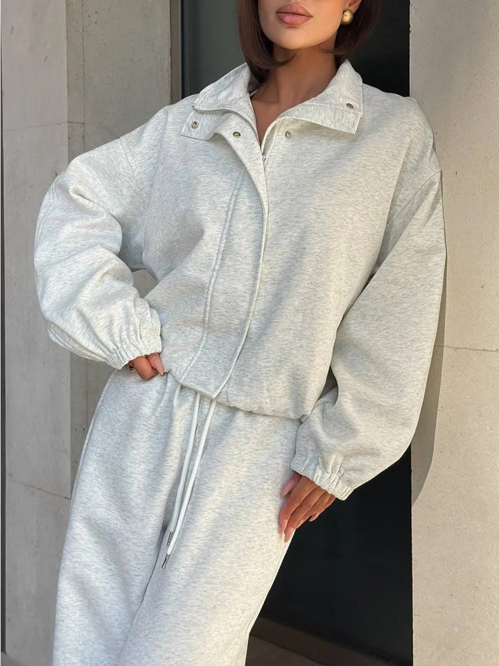 Damen gekürztes Reißverschluss-Hoodie mit Stehkragen und hochgeschnittener Kordel-Jogginghose Drune