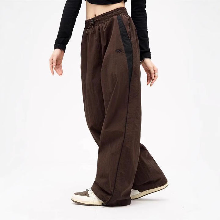 Damen nan weite Trackhose mit Kontrastpaspel, elastischem Bund und Oversize-Schnitt Drune
