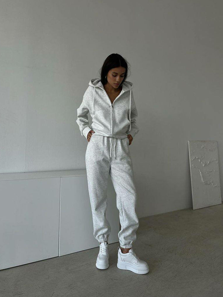 Damen lässiges Kapuzen-Sweatshirt und Jogginghose Set in Oversize-Passform mit Reißverschluss und Kängurutasche Drune