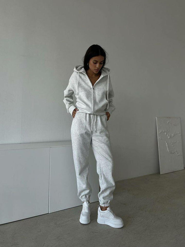 Damen lässiges Kapuzen-Sweatshirt und Jogginghose Set in Oversize-Passform mit Reißverschluss und Kängurutasche Drune