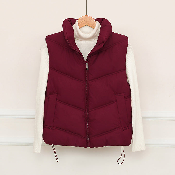 Damen Kurz geschnittene Puffer‑Steppweste mit V‑Quilt, hohem Stehkragen und Kordelzugsaum Drune