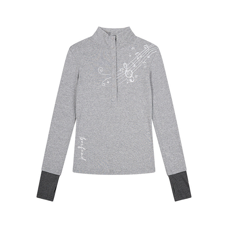 Damen Langarm-Poloshirt mit Stehkragen, Knopfleiste und Noten-Print Drune