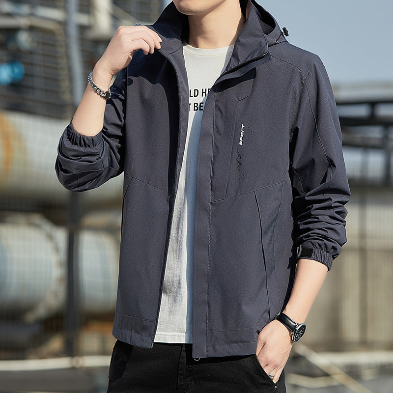 Herren Leichte Kapuzen-Softshelljacke mit winddichter Membran und minimalistischem Urban‑Schnitt Drune