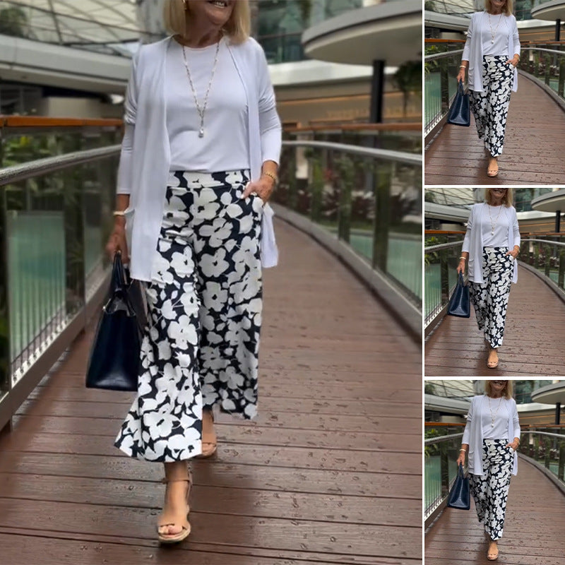 Damen nan weite Palazzohose mit großblumigem Print, hohem Bund und Eingrifftaschen Drune