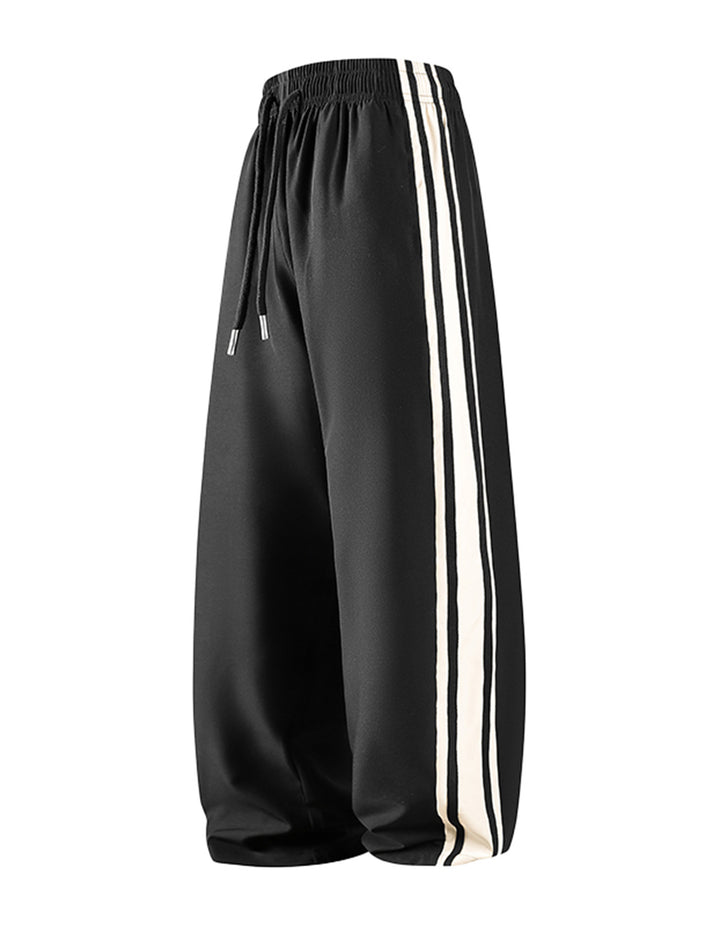 Damen Weite Trackpants mit Tunnelzugbund und seitlichen Kontraststreifen Drune