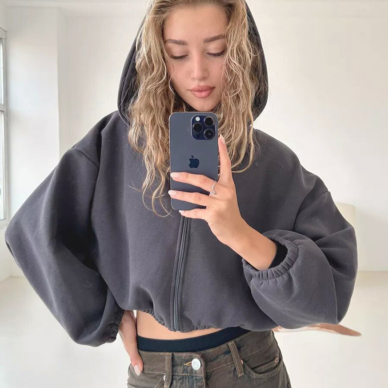 Damen kurzes Oversize-Kapuzen-Sweatshirt mit Reißverschluss, Ballonärmeln und elastischem Saum Drune