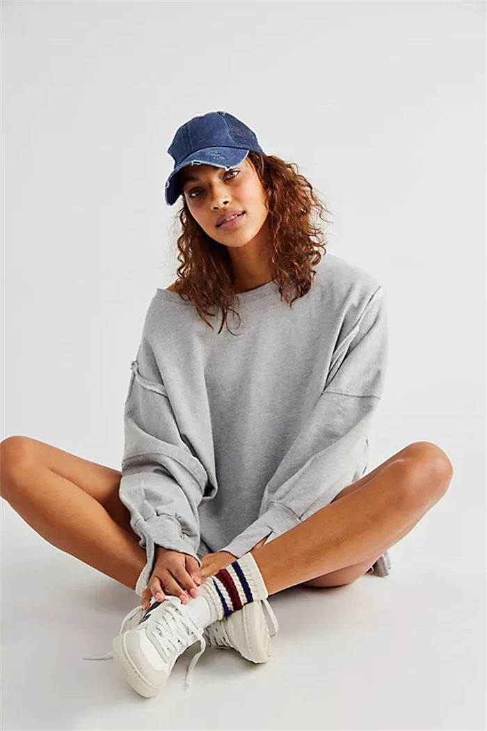 Damen oversized Sweatshirt mit Ballonärmeln, offenen Saumnähten und seitlichen Schlitzen Drune