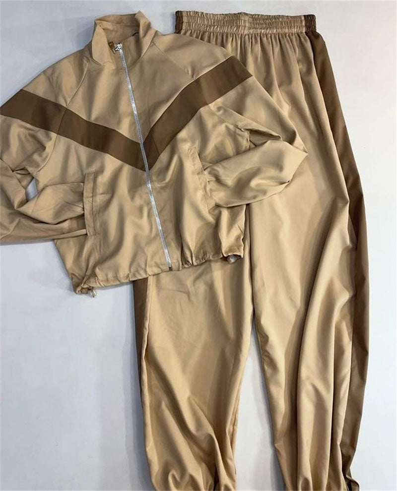 Damen tailliertes Zip-Trainingsset mit Chevron-Einsatz, Kordelzugsaum und hochgeschnittener Jogginghose Drune
