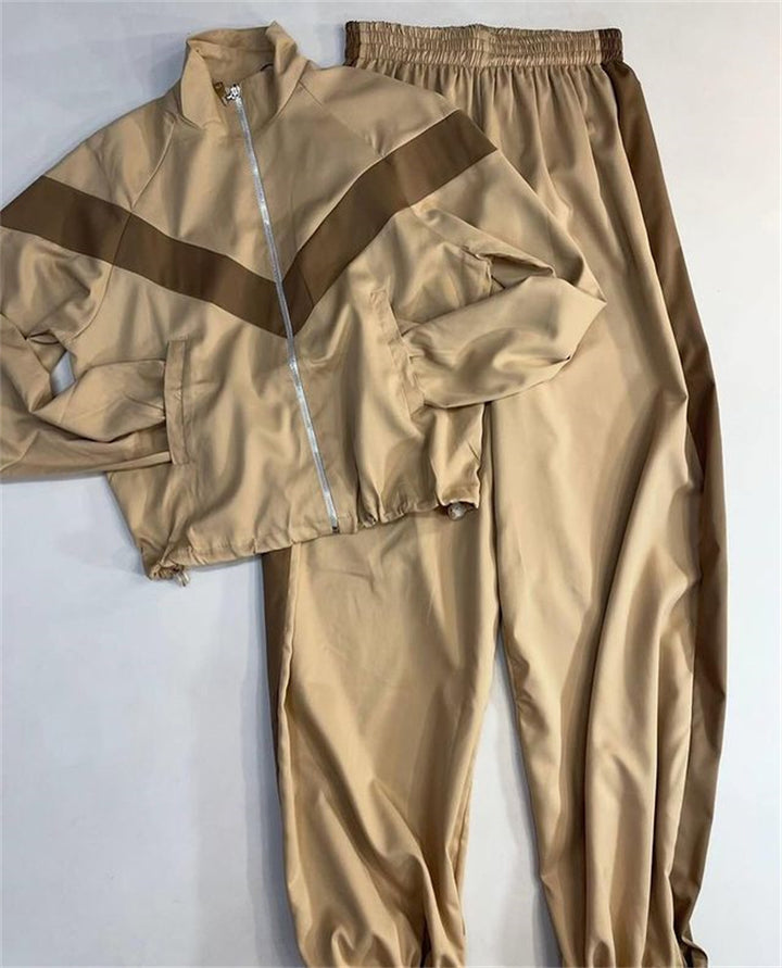 Damen tailliertes Zip-Trainingsset mit Chevron-Einsatz, Kordelzugsaum und hochgeschnittener Jogginghose Drune