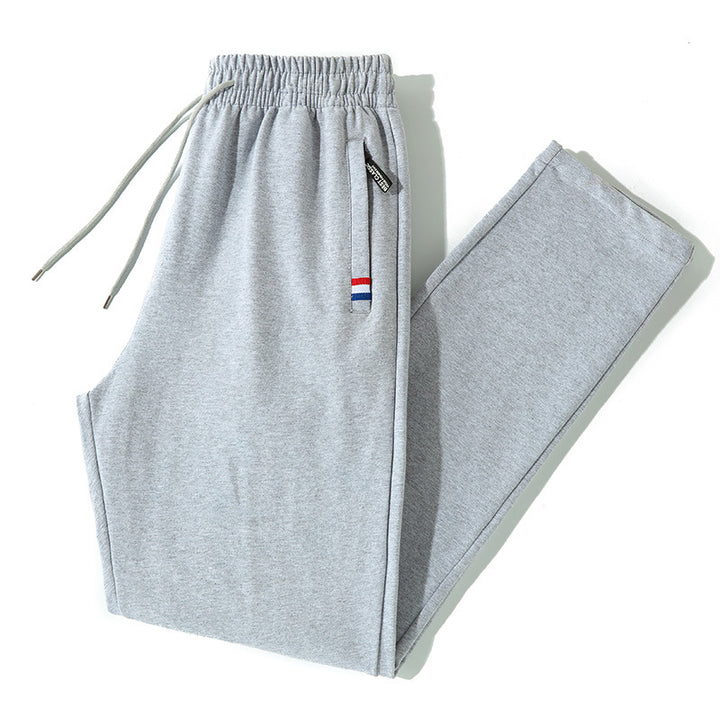 Herren Tapered-Jogginghose mit Tunnelzug, Reißverschlusstasche & Rippbündchen Drune