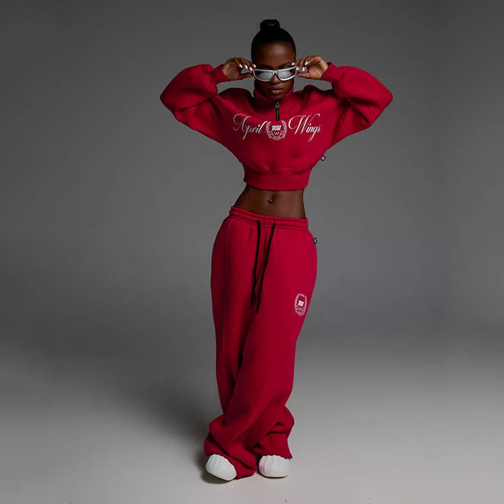 Damen gekürztes Halfzip-Sweatshirt mit Collegestickerei und weit geschnittene High‑Waist Lounge-Jogginghose Drune