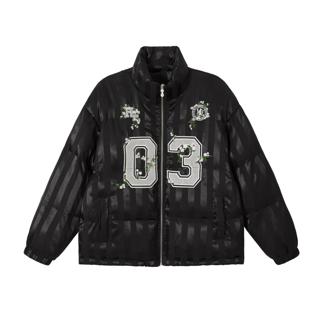 Damen Boxy gesteppte Satin‑Pufferjacke mit floralem Stickdetail Drune
