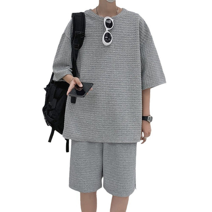 Herren nan quadratstruktur Freizeitset mit oversized Rundhalsshirt und knielangen Relax-Shorts Drune