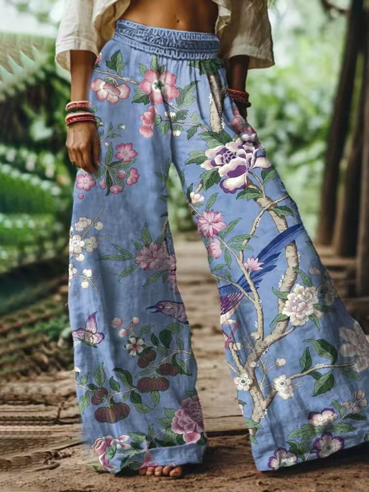Damen Weite Sommerhose mit buntem Blumen- und Schmetterlingsprint Drune